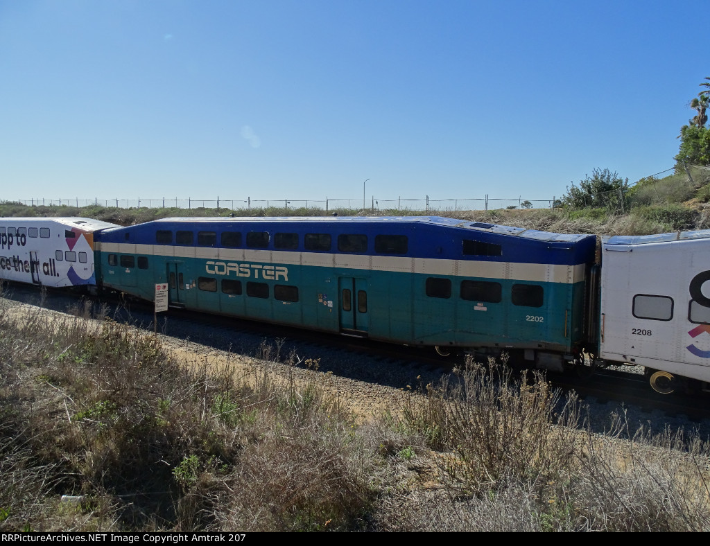 Coaster BiLevel Coach #2202 Heads North at Carlsbad